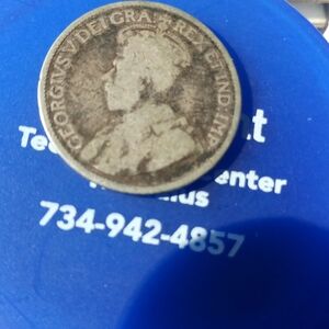 Vintage Coin with Profile Design